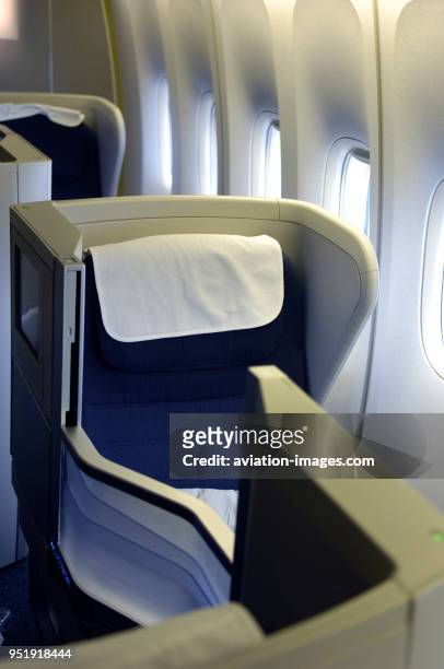 Empty seats in the business-class cabin of British Airways Boeing 747-400.