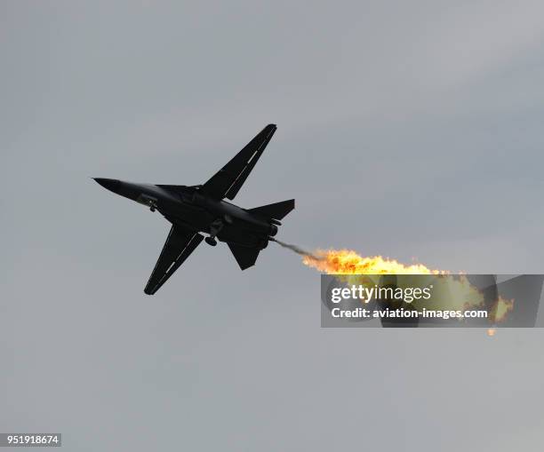 Royal Australian Air Force RAAF General Dynamics F-111C Aardvark 'Dragon's burn' in the flying-display at the Singapore-Airshow 2010.