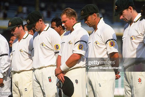 Steve Waugh, Adam Gilchrist, Shane Warne, Colin Miller and Damien Fleming of Australia observe a minute's silence for the death of Sir Donald Bradman...