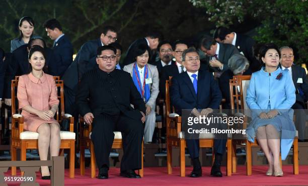Kim Jong Un, North Korea's leader, second left, and Moon Jae-in, South Korea's president, second right, Kim Jung-sook, South Korea's first lady,...