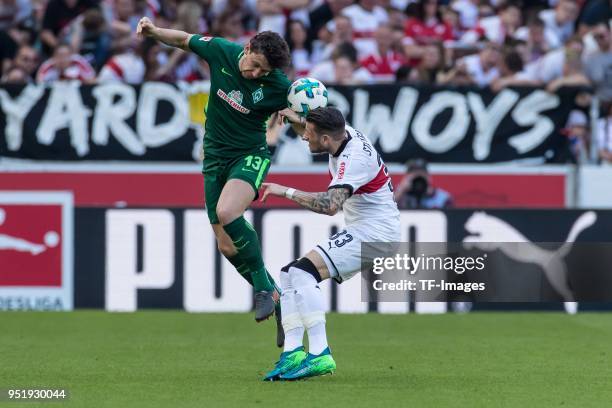 Milos Veljkovic of Bremen and Daniel Ginczek of Stuttgart battle for the ball during the Bundesliga match between VfB Stuttgart and SV Werder Bremen...