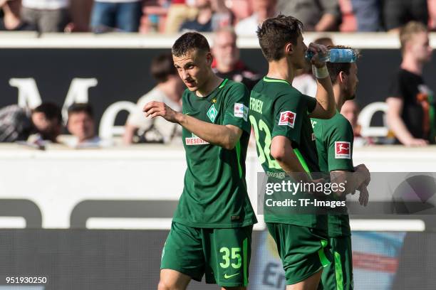 Marco Friedl of Bremen and Maximilian Eggestein of Bremen looks dejected after the Bundesliga match between VfB Stuttgart and SV Werder Bremen at...