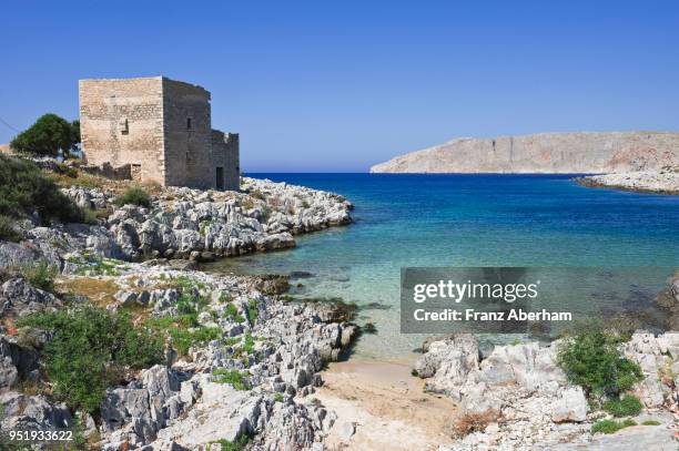 old stone tower in bay near gerolimenas, mani, greece - mani - fotografias e filmes do acervo