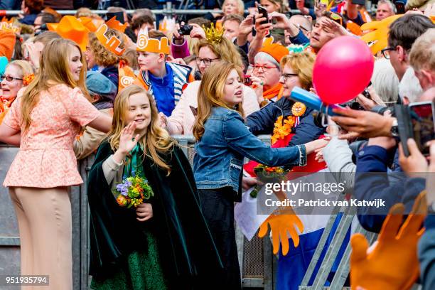 Princess Amalia of The Netherlands, Princess Alexia of The Netherlands and Princess Ariane of The Netherlands during the Kingsday celebration on...