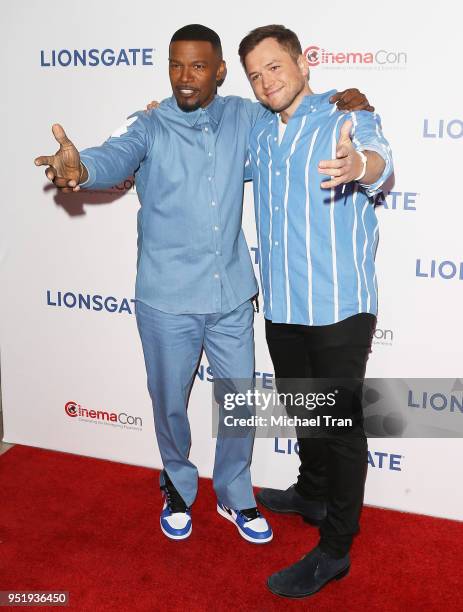 Jamie Foxx and Taron Egerton attend the 2018 CinemaCon - Lionsgate Presentation For 2018 Summer And Beyond held at The Colosseum at Caesars Palace on...