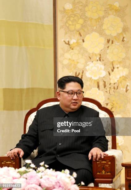 North Korean Leader Kim Jong Un upon his wife Ri Sol-ju's arrival at the Peace House on April 27, 2018 in Panmunjom, South Korea. Kim and Moon meet...
