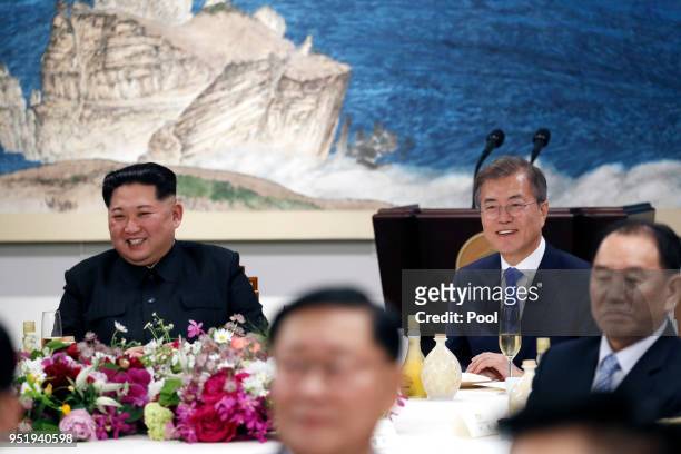 North Korean leader Kim Jong Un and South Korean President Moon Jae-in attend the Inter-Korean Summit dinner on April 27, 2018 in Panmunjom, South...