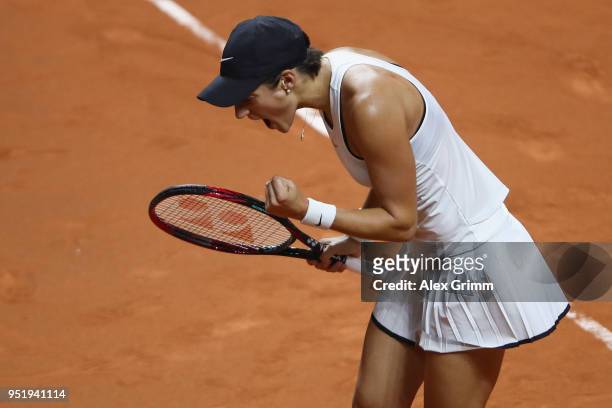 Caroline Garcia of France celebrates after winning the second set of her match against Elina Svitolina of Ukraine during day 5 of the Porsche Tennis...