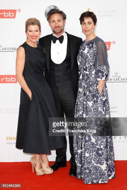 Anke Engelke, Benjamin Sadler and Nina Kunzendorf attend the Lola - German Film Award red carpet at Messe Berlin on April 27, 2018 in Berlin, Germany.