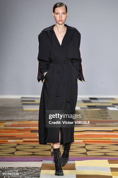 Model walks the runway at the Apartamento 03 Fall Winter 2018 fashion show during the SPFW N45 on April 25, 2018 in Sao Paulo, Brazil.