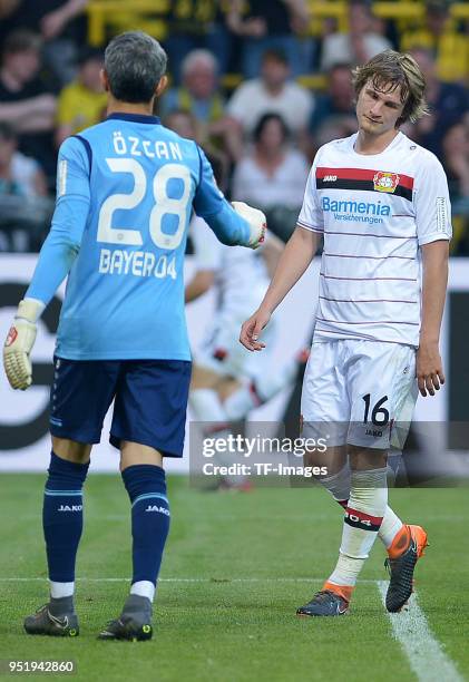 Goalkeeper Ramazan Oezcan of Leverkusen and Tin Jedvaj of Leverkusen look dejected during the Bundesliga match between Borussia Dortmund and Bayer 04...