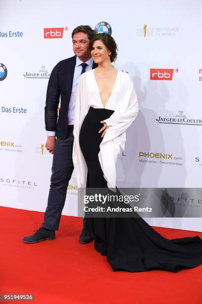 Ronald Zehrfeld and Christina Hecke attend the Lola - German Film Award red carpet at Messe Berlin on April 27, 2018 in Berlin, Germany.