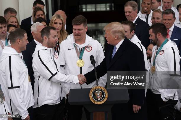 President Donald Trump greets members of the men's curling team John Shuster , Tyler George , and Matt Hamilton, as he hosts Team USA at the North...