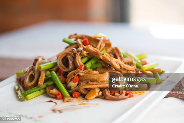 pork tripe & garlic scape stems of green - tripe stock pictures, royalty-free photos & images