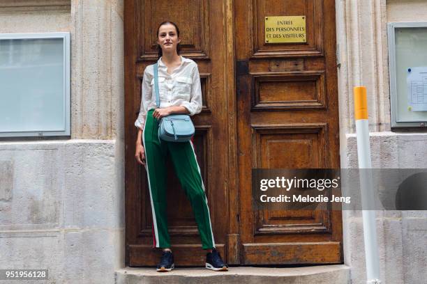 Model Felice Nova carries a blue Michael Kors bag on July 02, 2017 in Paris, France.