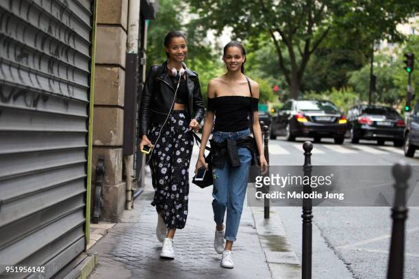 Dominican models Lineisy Montero, Hiandra Martinez after the Proenza Schouler show on July 02, 2017 in Paris, France. Lineisy wears Beats headphones,...