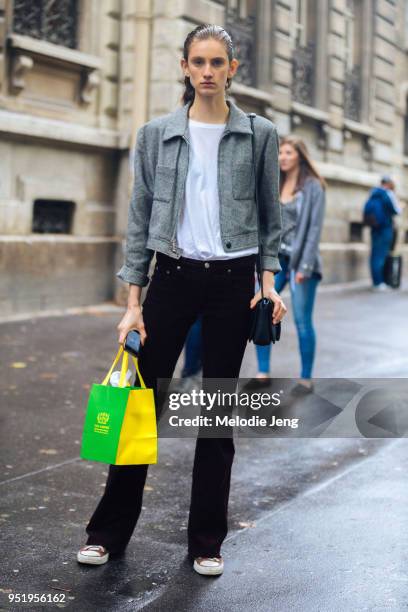 Model Sarah Berger wears a cropped jacket on July 02, 2017 in Paris, France.