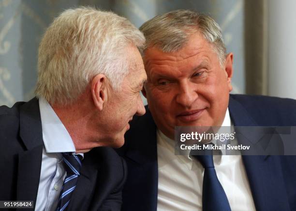 Russian businessmen: Rosneft's CEO Igor Sechin listens to Volga group owner Gennady Timchenko during his meeting at Russian Geographic Society on...