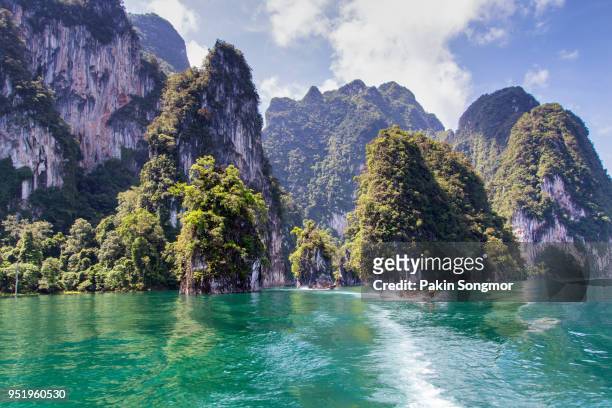 beautiful mountains lake river sky and natural attractions in ratchaprapha dam at khao sok national park - kao sok national park fotografías e imágenes de stock