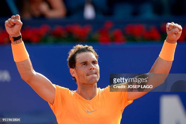 Spain's Rafael Nadal reacts after beating Slovakia's Martin Klizan during their Barcelona Open ATP tournament quarter-final tennis match in Barcelona...