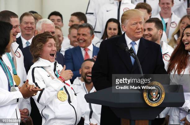 Olympic gold medalist snowboarder Red Gerard reacts as U.S. President Donald Trump speaks during a celebration of the USA 2018 Winter Olympic and...