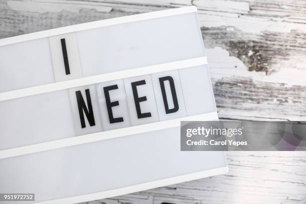 i need message in white lightbox. concept - afhankelijkheid stockfoto's en -beelden