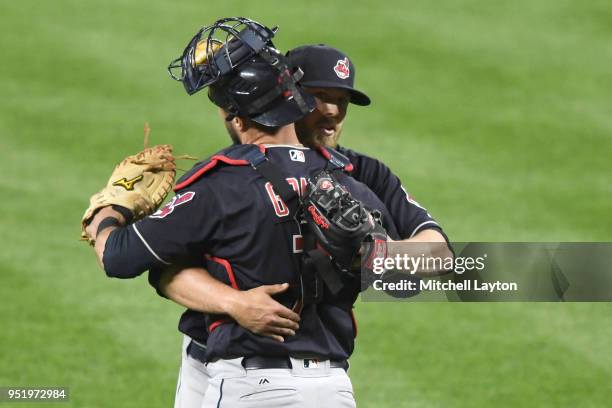 Cody Allen of the Cleveland Indians celebrates a win with Yan Gomes after a baseball game against the Baltimore Orioles at Oriole Park at Camden...