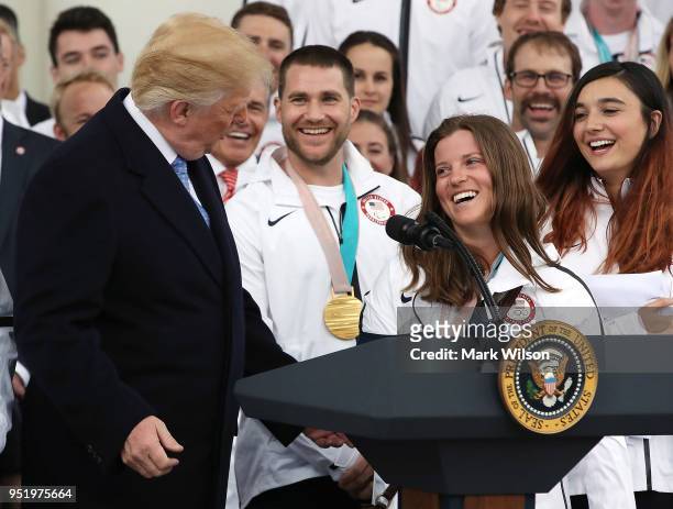 Olympic bronze medalist snowboarder Arielle Gold laughs with U.S. President Donald Trump during a celebration of the USA 2018 Winter Olympic and...