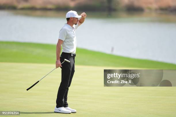 Paul Peterson of the United States looks on during the day two of the 2018 Volvo China Open at Topwin Golf and Country Club on April 27, 2018 in...