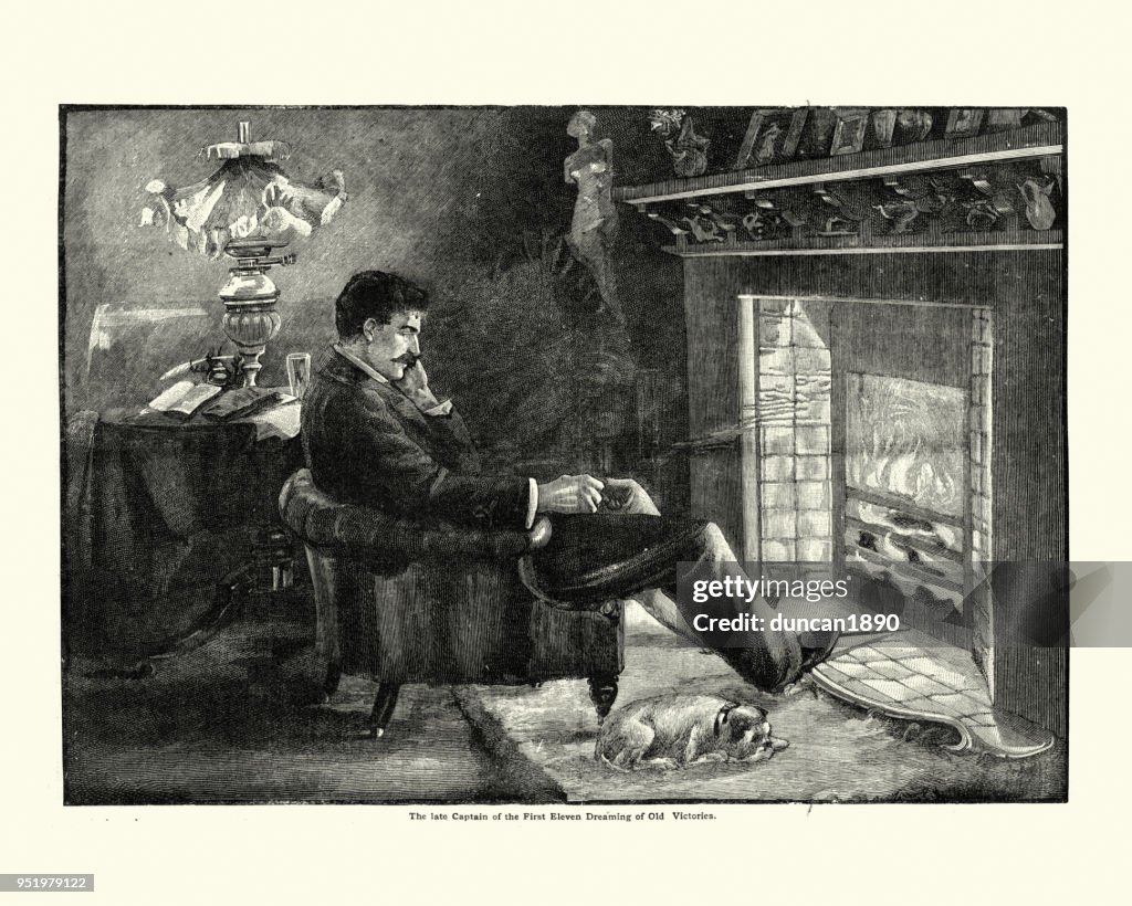 Victorian man relaxing before a fire thinking of former glories