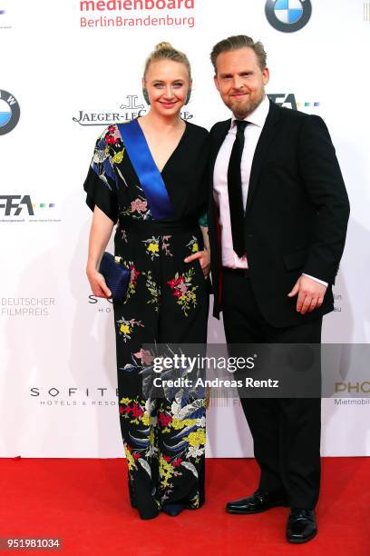 Anna Maria Muehe and Axel Stein attend the Lola - German Film Award red carpet at Messe Berlin on April 27, 2018 in Berlin, Germany.