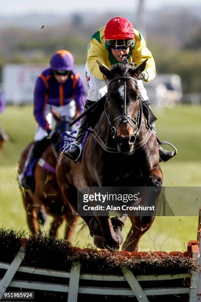 Robbie Power riding Supasundae cler the last to win The Betdaq 2% Commission Punchestown Champion Hurdle at Punchestown racecourse on April 27, 2018...