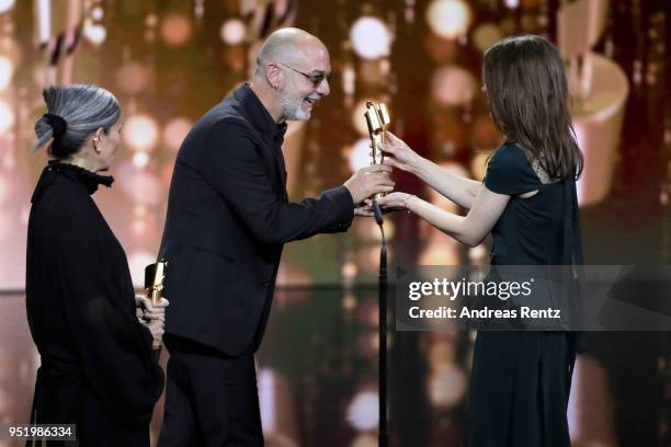Morag Ross and Massimo Gattabrusi reveice their award 'Best Makeup' for the movie 'Manifesto' from Paula Beer on stage during the Lola - German Film...