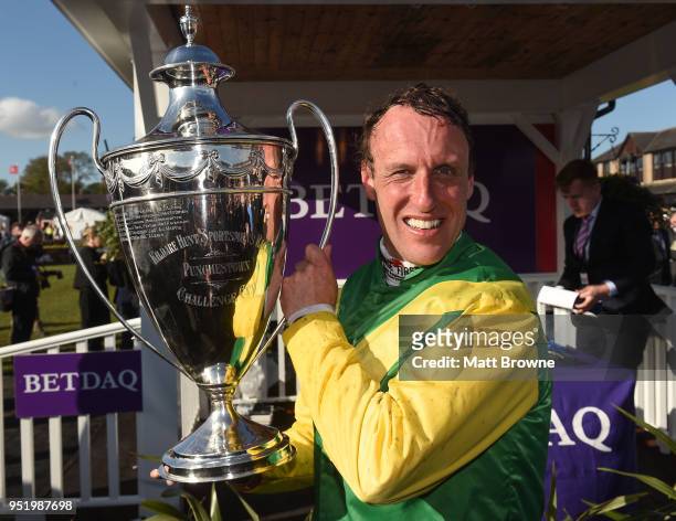 Kildare , Ireland - 27 April 2018; Jockey Robbie Power with the cup after winning The BETDAQ 2% Commission Punchestown Champion Hurdle on Supasundae...