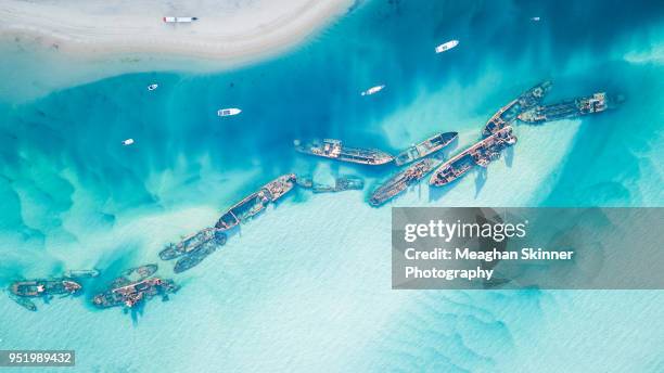 tangalooma wrecks - queensland beaches stock pictures, royalty-free photos & images