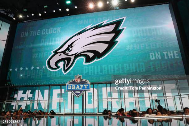 The Philadelphia Eagles logo is seen on a video board during the first round of the 2018 NFL Draft at AT&T Stadium on April 26, 2018 in Arlington,...