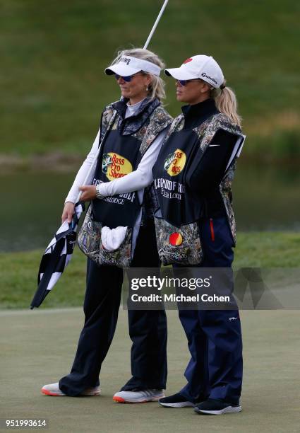 Vikki Carol Langer and Melissa Lehman work as caddies during the final round of the PGA TOUR Champions Bass Pro Shops Legends of Golf at Big Cedar...