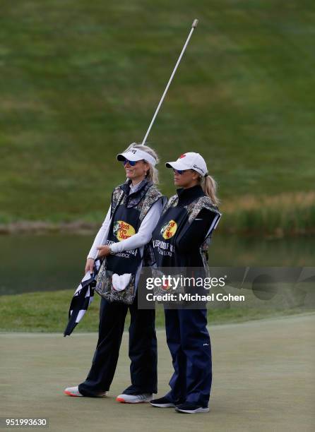 Vikki Carol Langer and Melissa Lehman work as caddies during the final round of the PGA TOUR Champions Bass Pro Shops Legends of Golf at Big Cedar...