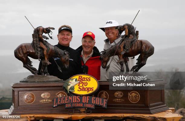 Paul Broadhurst Johnny Morris, Founder of Bass Pro Shops and Kirk Triplett pose with the trophy at the Trophy Presentation after the final round of...