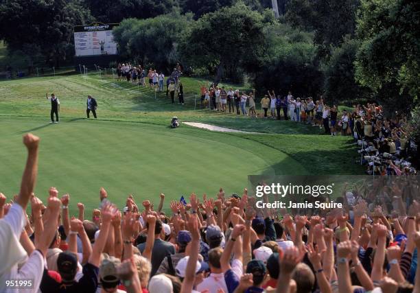 Jose Maria Olazabal of the European team celebrates on the 14th green after a 5 & 4 victory in his Saturday Afternoon Foursomes match alongside...