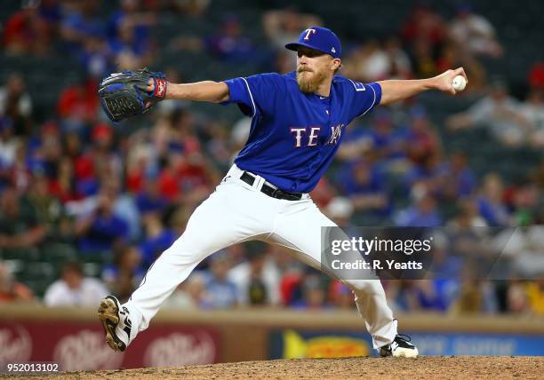 Jake Diekman of the Texas Rangers throws in the eight inning against the Oakland Athletics at Globe Life Park in Arlington on April 24, 2018 in...