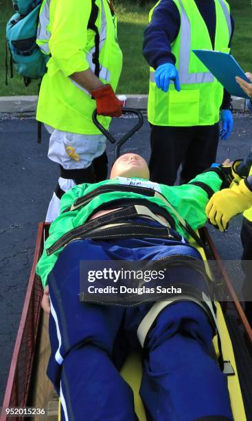 mannequin is used as a rescue victim during an disaster exercise - disaster preparation stock pictures, royalty-free photos & images