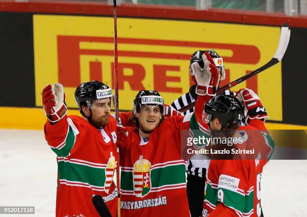 Balint Magosi of Hungary, Krisztian Nagy of Hungary and Andras Benk of Hungary celebrate the second goal during the 2018 IIHF Ice Hockey World...