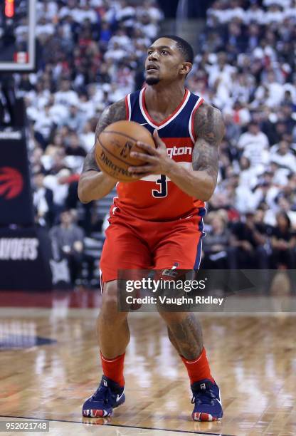 Bradley Beal of the Washington Wizards shoots the ball during the first half of Game Five against the Toronto Raptors in Round One of the 2018 NBA...