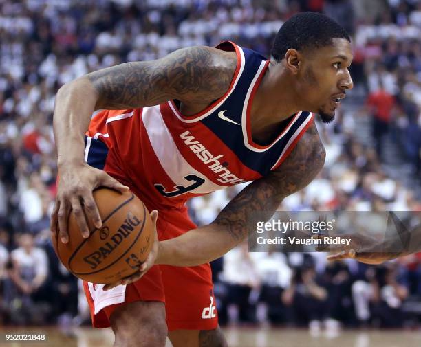 Bradley Beal of the Washington Wizards dribbles the ball during the first half of Game Five against the Toronto Raptors in Round One of the 2018 NBA...