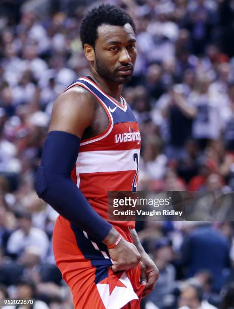 John Wall of the Washington Wizards looks on during the second half of Game Five against the Toronto Raptors in Round One of the 2018 NBA playoffs at...