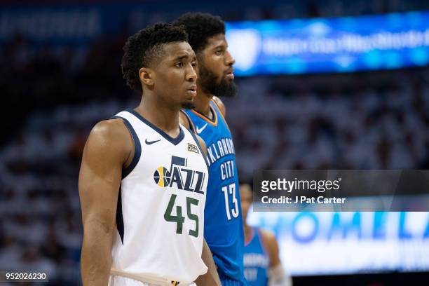 Donovan Mitchell of the Utah Jazz and Paul George of the Oklahoma City Thunderduring game 5 of the Western Conference playoffs at the Chesapeake...