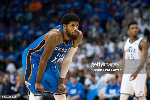 Paul George of the Oklahoma City Thunder watches action against the utah Jazz during game 5 of the Western Conference playoffs at the Chesapeake...