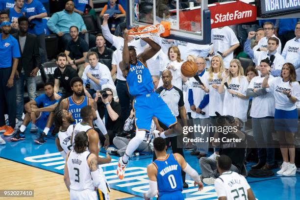 Jerami Grant of the Oklahoma City Thunder dunks two points during game 5 of the Western Conference playoffs at the Chesapeake Energy Arena on April...