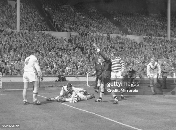 Aston of Wigan gets the ball just over the line but referee Davies blows up for a penalty Aston had already grounded the ball before crossing the...